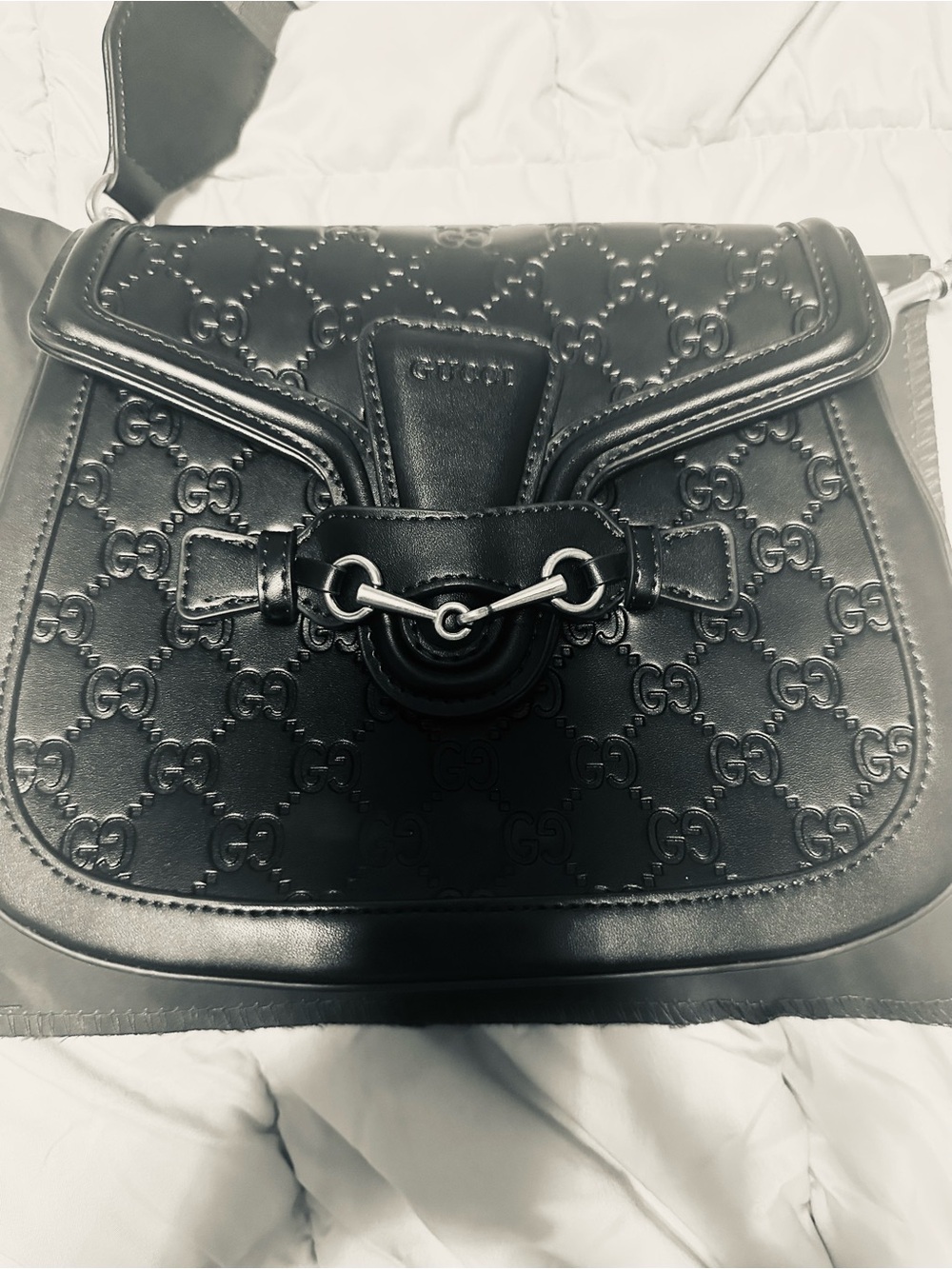 Black Quilted Embossed Crossbody Bag